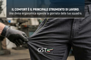 Primo piano di una mano che tende il tessuto elastico di un pantalone per mostrare la flessibilit&agrave; dell'abbigliamento da lavoro comodo targato GST.